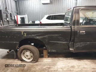 1995 Ford Ranger Splash z VIN 1FTCR10A7STA63518, wystawiony jako IAAI lot #42098095 z przebiegiem 75 409 mil mil oraz . Historia ofert i sprzedaży dostępna na DreamBid. Obrazek 18.