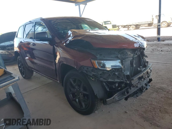 2021 Jeep Grand Cherokee 80th Anniversary with VIN 1C4RJFBG3MC631086, listed as a Copart auction lot 57304375 with 57,872 mi miles and Salvage title. Bid and sale history available at DreamBid. Image 4.