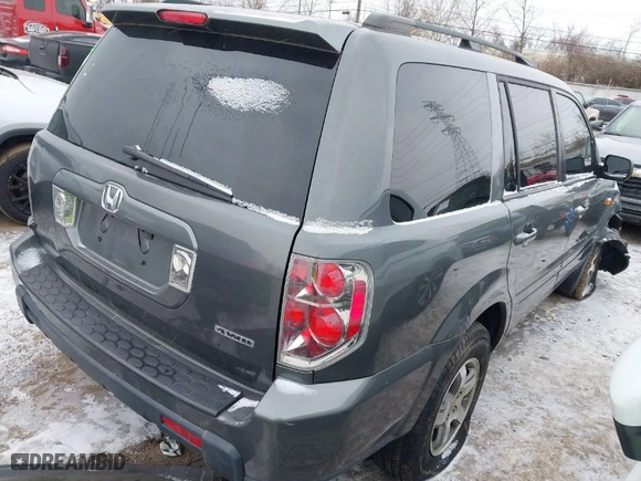 2007 Honda Pilot EX with VIN 2HKYF18427H513083, listed as a IAAI auction lot 41376346 with 301,841 mi miles. Bid and sale history available at carsss.com. Image 4.