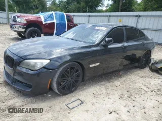 2014 BMW 7 Series 740Li with VIN WBAYE4C53ED137952, listed as a Copart auction lot 62829515 with 151,160 mi miles and Salvage title. Bid and sale history available at DreamBid. Image 1.