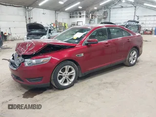 2015 Ford Taurus SEL z VIN 1FAHP2H88FG163179, wystawiony jako IAAI lot #42345579 z przebiegiem 142 424 mil mil oraz . Historia ofert i sprzedaży dostępna na DreamBid. Obrazek 17.