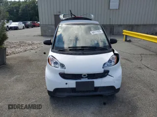 2015 Smart fortwo Passion z VIN WMEEJ3BA8FK797266, wystawiony jako Copart lot #64777655 z przebiegiem 20 995 mil mil oraz Szkoda całkowita • Salvage title. Historia ofert i sprzedaży dostępna na DreamBid. Obrazek 5.