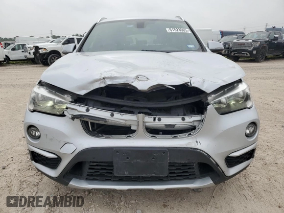 2018 BMW X1 sDrive28i with VIN WBXHU7C32J5L05237, listed as a Copart auction lot 51523905 with 75,638 mi miles and Salvage Title. Bid and sale history available at carsss.com. Image 5.