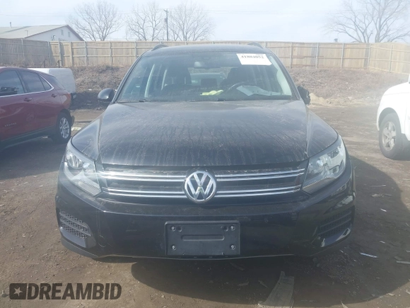 2017 Volkswagen Tiguan S with VIN WVGBV7AX9HK018085, listed as a IAAI auction lot 41804052 with 71,943 mi miles and . Bid and sale history available at DreamBid. Image 12.