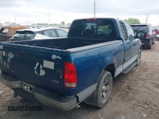 1999 Ford F-150 XL with VIN 1FTRX17L0XNC07560, listed as a IAAI auction lot 42183858 with Not provided miles and . Bid and sale history available at DreamBid. Image 4.