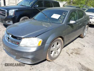 2013 Dodge Avenger SE with VIN 1C3CDZAB1DN658140, listed as a IAAI auction lot 41998306 with 215,548 mi miles. Bid and sale history available at carsss.com. Image 2.