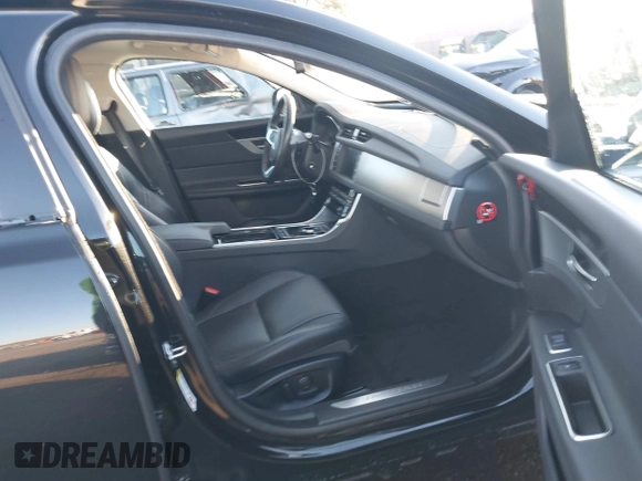 2018 Jaguar XF with VIN SAJBE4EV4JCY56439, listed as a IAAI auction lot 41390873 with 59,599 mi miles and . Bid and sale history available at DreamBid. Image 5.