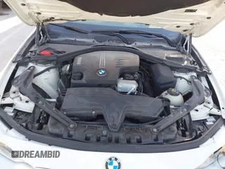 2015 BMW 4 Series 428i xDrive with VIN WBA3T1C51FP821140, listed as a IAAI auction lot 41802697 with 95,232 mi miles and . Bid and sale history available at carsss.com. Image 10.