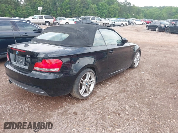 2009 BMW 1 Series 135i with VIN WBAUN93569VK40701, listed as a IAAI auction lot 42099169 with 115,997 mi miles and . Bid and sale history available at DreamBid. Image 4.