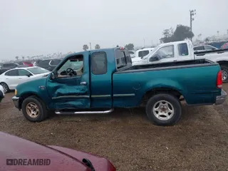 1998 Ford F-150 Standard with VIN 1FTZX1767WKB36013, listed as a IAAI auction lot 41892513 with 193,237 mi miles. Bid and sale history available at carsss.com. Image 14.