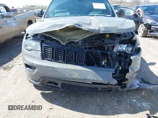 2019 Jeep Grand Cherokee Upland with VIN 1C4RJFAG5KC608293, listed as a IAAI auction lot 41989929 with 129,229 mi miles. Bid and sale history available at carsss.com. Image 6.