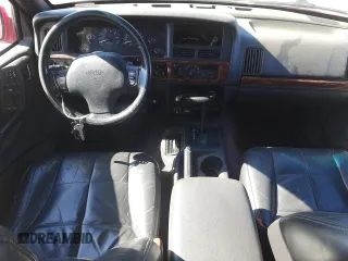 1996 Jeep Grand Cherokee Limited with VIN 1J4GZ78Y0TC376265, listed as a Copart auction lot 52124345 with 205,676 mi miles and Salvage Title. Bid and sale history available at carsss.com. Image 8.