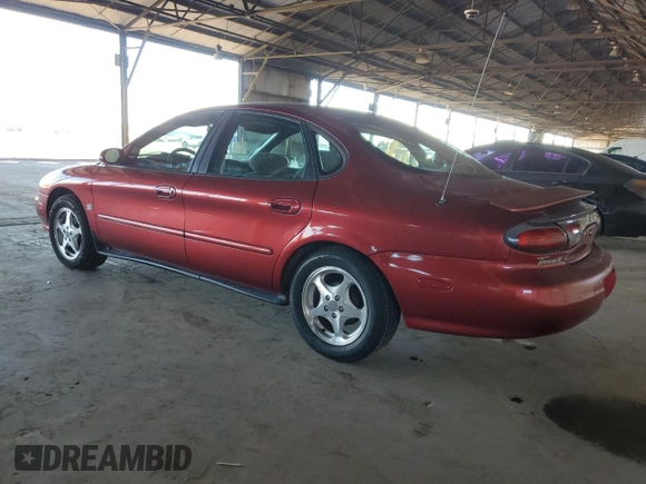 1999 Ford Taurus SE with VIN 1FAFP53S9XA297537, listed as a Copart auction lot 43862035 with 145,983 mi miles and Salvage title. Bid and sale history available at DreamBid. Image 2.