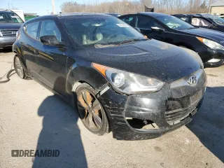 2012 Hyundai Veloster w/Red Int with VIN KMHTC6AD5CU030242, listed as a Copart auction lot 83016604 with 142,555 mi miles and Salvage title. Bid and sale history available at DreamBid. Image 4.