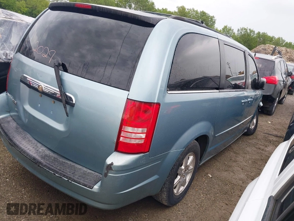 2008 Chrysler Town & Country Touring with VIN 2A8HR54P08R663396, listed as a IAAI auction lot 39554554 with 174,327 mi miles and . Bid and sale history available at DreamBid. Image 4.