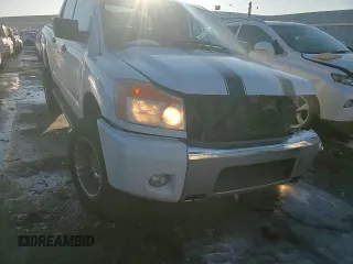 2012 Nissan Titan SV with VIN 1N6AA0EC1CN326088, listed as a Copart auction lot 42799335 with 163,218 mi miles and Salvage Title. Bid and sale history available at carsss.com. Image 10.
