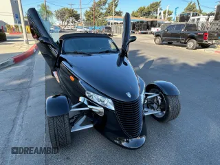 2000 Plymouth Prowler z VIN 1P3EW65G6YV602347, wystawiony jako Copart lot #71067714 z przebiegiem 65 554 mil mil oraz Tytuł czysty. Historia ofert i sprzedaży dostępna na DreamBid. Obrazek 8.