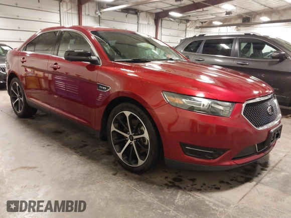 2014 Ford Taurus SHO with VIN 1FAHP2KT9EG130834, listed as a IAAI auction lot 41748199 with 98,857 mi miles and . Bid and sale history available at carsss.com. Image 1.