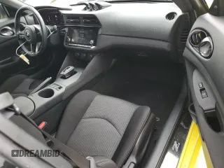 2023 Nissan Z Sport z VIN JN1BZ4AH0PM310987, wystawiony jako Copart lot #74926264 z przebiegiem 10 474 mil mil oraz Szkody całkowita. Historia ofert i sprzedaży dostępna na DreamBid. Obrazek 8.