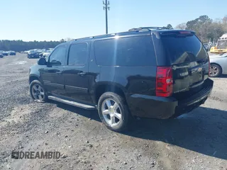 2011 Chevrolet Suburban LT with VIN 1GNSCJE06BR402433, listed as a IAAI auction lot 41819335 with 203,335 mi miles. Bid and sale history available at carsss.com. Image 3.