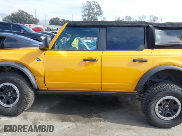 2022 Ford Bronco with VIN 1FMEE5DH6NLB14350, listed as a IAAI auction lot 41486823 with 27,587 mi miles and . Bid and sale history available at DreamBid. Image 14.