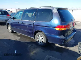 2004 Honda Odyssey EX z VIN 5FNRL18614B080980, wystawiony jako IAAI lot #41940014 z przebiegiem 233 465 mil mil oraz . Historia ofert i sprzedaży dostępna na DreamBid. Obrazek 3.