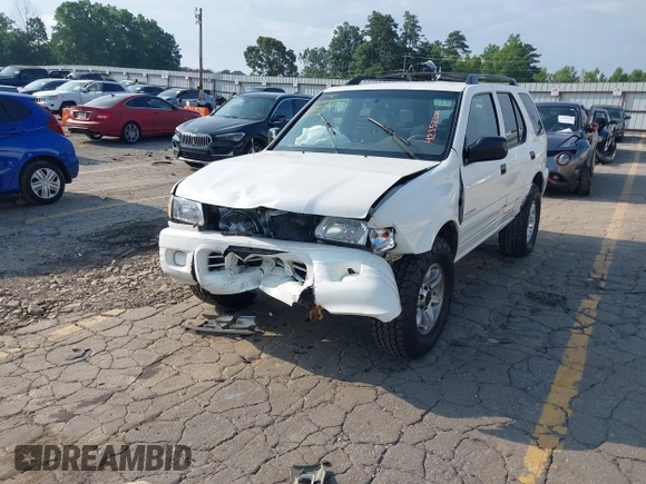 2002 Isuzu Rodeo S with VIN 4S2CK58W524321108, listed as a IAAI auction lot 42352330 with 270,614 mi miles and . Bid and sale history available at DreamBid. Image 18.
