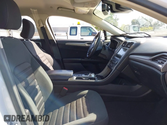 2019 Ford Fusion Hybrid SE with VIN 3FA6P0LU9KR207824, listed as a IAAI auction lot 42153330 with 69,966 mi miles. Bid and sale history available at carsss.com. Image 5.