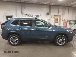 2020 Jeep Cherokee Latitude Plus with VIN 1C4PJMLB2LD523534, listed as a IAAI auction lot 41942131 with 66,676 mi miles and . Bid and sale history available at DreamBid. Image 13.