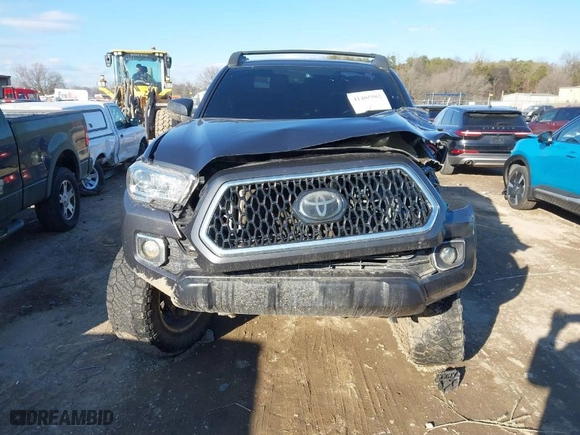 2018 Toyota Tacoma SR with VIN 3TMCZ5AN3JM179188, listed as a IAAI auction lot 41405502 with 102,818 mi miles. Bid and sale history available at carsss.com. Image 12.