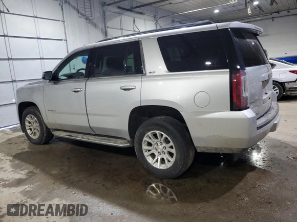 2019 GMC Yukon SLT with VIN 1GKS2BKCXKR349370, listed as a Copart auction lot 46880055 with 115,266 mi miles and Clean Title. Bid and sale history available at carsss.com. Image 2.