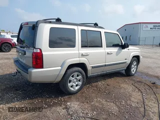 2007 Jeep Commander Sport z VIN 1J8HG48K87C696538, wystawiony jako IAAI lot #39853716 z przebiegiem 226 491 mil mil oraz . Historia ofert i sprzedaży dostępna na DreamBid. Obrazek 4.