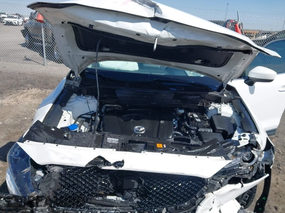 2018 Mazda CX-5 Grand Touring with VIN JM3KFBDM0J0404635, listed as a IAAI auction lot 41883068 with 71,178 mi miles. Bid and sale history available at carsss.com. Image 10.