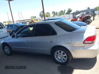 2002 Honda Accord SE z VIN JHMCG66892C011913, wystawiony jako IAAI lot #42323509 z przebiegiem 226 288 mil mil oraz . Historia ofert i sprzedaży dostępna na DreamBid. Obrazek 14.