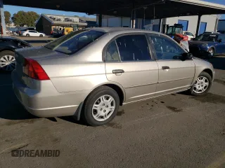 2001 Honda Civic LX with VIN 1HGES15561L022838, listed as a Copart auction lot 83866374 with 179,691 mi miles and Salvage Title. Bid and sale history available at DreamBid. Image 3.