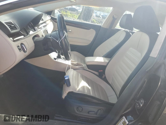 2012 Volkswagen CC Lux Limited with VIN WVWHN7AN0CE517071, listed as a Copart auction lot 73108444 with 310,526 mi miles and Salvage Title. Bid and sale history available at carsss.com. Image 7.