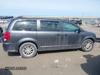 2019 Dodge Grand Caravan SXT with VIN 2C4RDGCG1KR514123, listed as a IAAI auction lot 41777811 with 119,087 mi miles and . Bid and sale history available at DreamBid. Image 14.