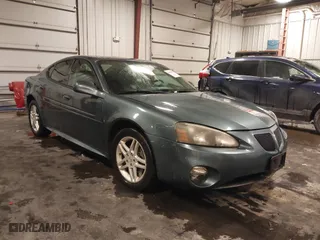 2006 Pontiac Grand Prix GT with VIN 2G2WR554461315118, listed as a IAAI auction lot 41583027 with 243,614 mi miles. Bid and sale history available at carsss.com. Image 1.