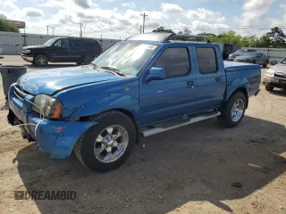 2003 Nissan Frontier XE z VIN 1N6ED27TX3C434061, wystawiony jako Copart lot #56834655 z przebiegiem 208 857 mil mil oraz Szkody całkowita. Historia ofert i sprzedaży dostępna na DreamBid. Obrazek 1.