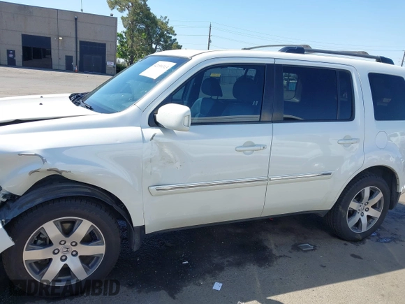 2013 Honda Pilot Touring with VIN 5FNYF4H92DB031589, listed as a IAAI auction lot 42159313 with 192,604 mi miles and . Bid and sale history available at carsss.com. Image 14.