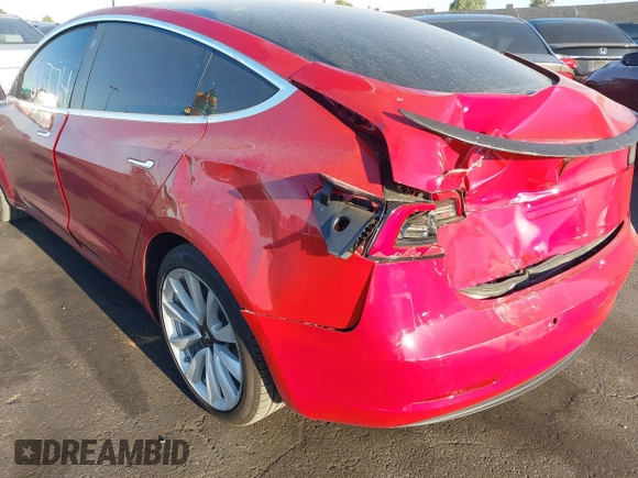 2018 Tesla Model 3 Long Range Battery with VIN 5YJ3E1EA3JF035785, listed as a IAAI auction lot 41986774 with 33,965 mi miles and . Bid and sale history available at DreamBid. Image 20.