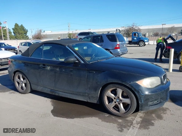 2009 BMW 1 Series 135i with VIN WBAUN93529VK40520, listed as a IAAI auction lot 41266367 with 147,650 mi miles. Bid and sale history available at carsss.com. Image 1.
