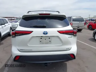 2021 Toyota Highlander Hybrid XLE z VIN 5TDHARAH4MS006945, wystawiony jako IAAI lot #42381038 z przebiegiem 68 276 mil mil oraz . Historia ofert i sprzedaży dostępna na DreamBid. Obrazek 16.