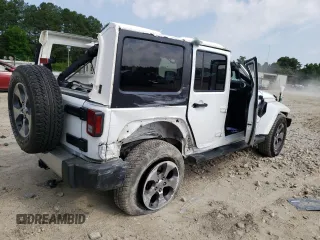 2018 Jeep Wrangler JK Unlimited Sahara with VIN 1C4BJWEG7JL856975, listed as a Copart auction lot 59562484 with 101,419 mi miles and Salvage Title. Bid and sale history available at carsss.com. Image 3.