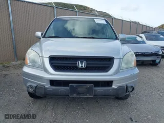 2005 Honda Pilot EX-L with NAVI with VIN 2HKYF18755H552502, listed as a IAAI auction lot 41921122 with 187,904 mi miles. Bid and sale history available at carsss.com. Image 12.