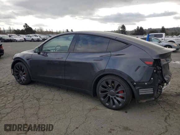 2024 Tesla Model Y Performance with VIN 7SAYGDEF7RF093054, listed as a Copart auction lot 50747985 with 26,907 mi miles and Salvage Title. Bid and sale history available at DreamBid. Image 2.