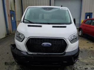 2023 Ford Transit Cargo with VIN 1FTBR1Y87PKA28570, listed as a Copart auction lot 77250383 with Not Provided miles and . Bid and sale history available at DreamBid. Image 5.