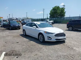 2020 Ford Fusion Titanium z VIN 3FA6P0SUXLR159298, wystawiony jako IAAI lot #42501699 z przebiegiem 100 474 mil mil oraz . Historia ofert i sprzedaży dostępna na DreamBid. Obrazek 1.