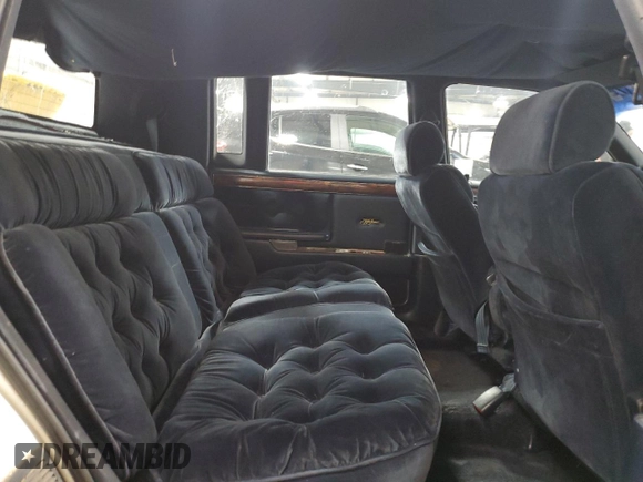 1991 Chrysler New Yorker z VIN 1C3XY66R1MD290977, wystawiony jako Copart lot #83359124 z przebiegiem 98 611 mil mil oraz Szkoda całkowita • Salvage title. Historia ofert i sprzedaży dostępna na DreamBid. Obrazek 10.