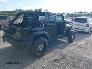 2016 Jeep Wrangler Unlimited Sport with VIN 1C4BJWDG6GL328550, listed as a IAAI auction lot 42741356 with 32,120 mi miles and . Bid and sale history available at DreamBid. Image 4.